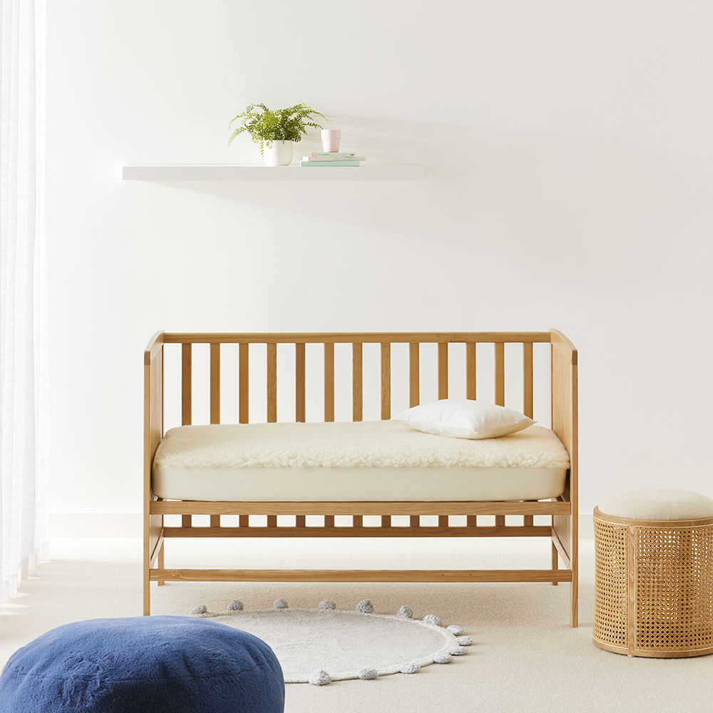 Baby cot mattress clearance topper