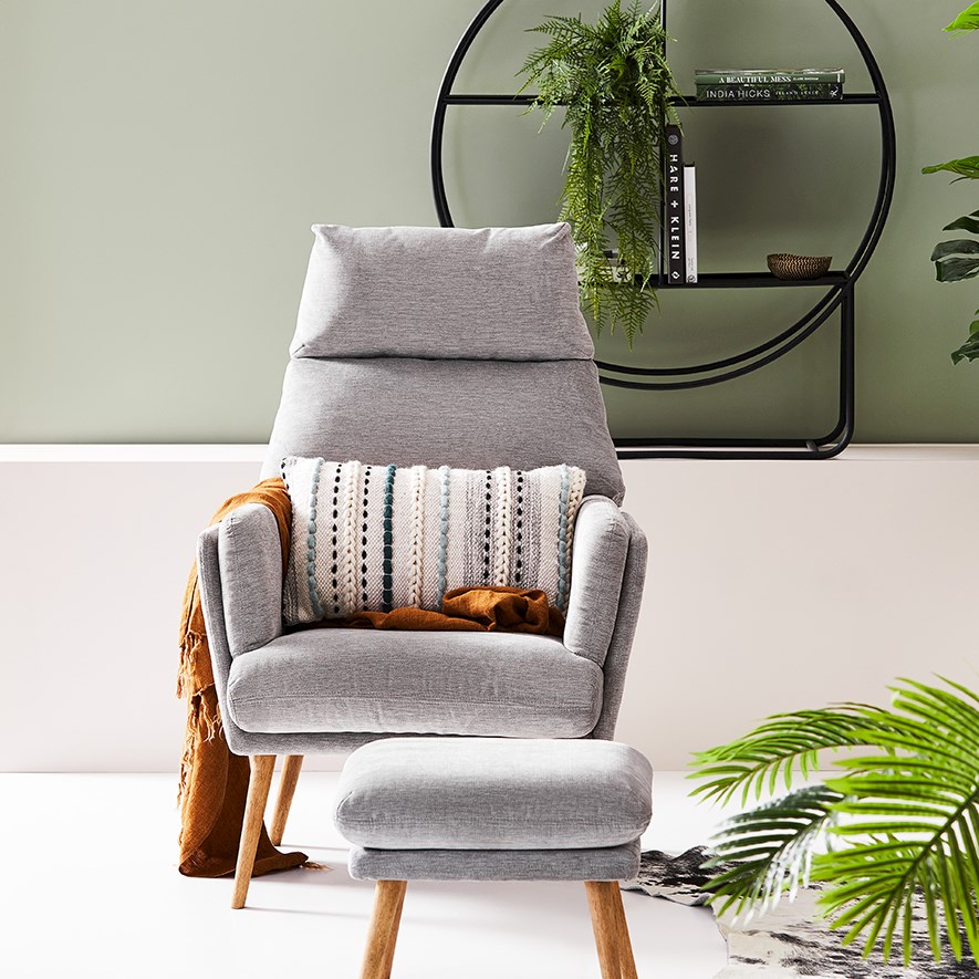 grey chair and foot stool